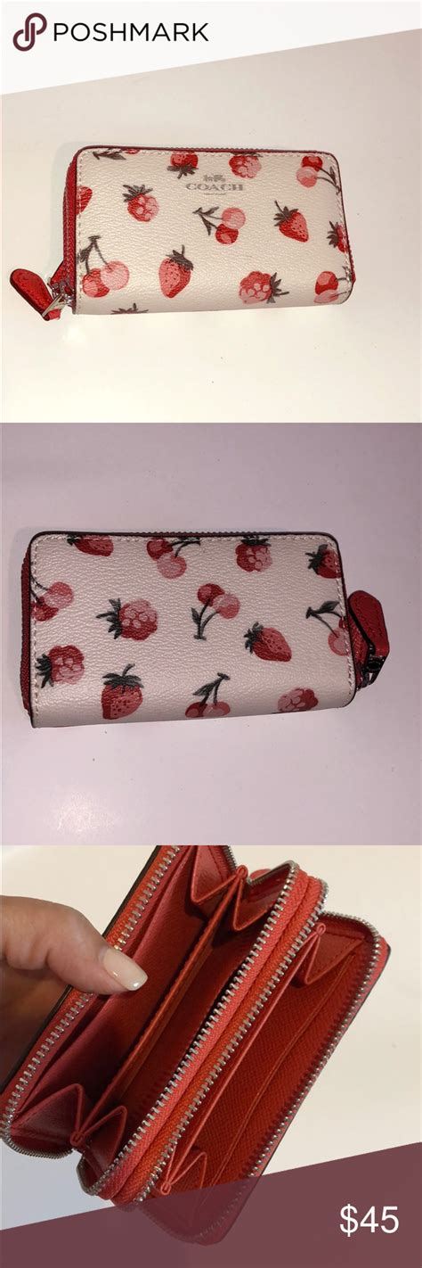 coach strawberry and cherry wallet.